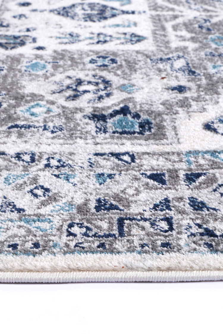 Ligures Cream Blue Traditional Rug